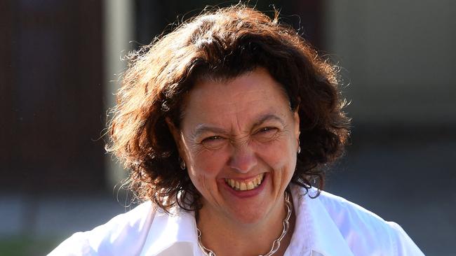 Independent candidate Monique Ryan speaks to voters at a polling booth as she challenges Australia's Treasurer Josh Frydenberg in the Liberal seat of Kooyong in Melbourne on May 21, 2022. (Photo by William WEST / AFP)