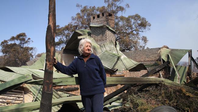 Penny Stanbridge outside her home yesterday after it was destroyed by the blaze. Picture: David Swift