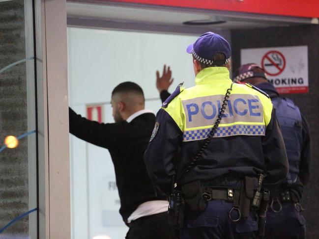 Darlinghurst Assault. At approx 2:50 am reports of minor assault in KingsCross came in. On arrival we saw that police were in the middle of a short foot chase to stop and search 6 males. All males were padded down, handcuffed and taken away in paddy wagons. It's not yet clear what their involvement was in any events in the cross. I did not see any other media on scene during this operation. Pic: Steve Tyson