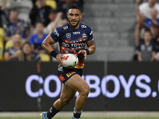 TOWNSVILLE, AUSTRALIA - MAY 24: Valentine Holmes of the Cowboys scores a try during the round 12 NRL match between North Queensland Cowboys and Wests Tigers at Qld Country Bank Stadium, on May 24, 2024, in Townsville, Australia. (Photo by Ian Hitchcock/Getty Images)