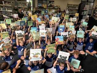 BOOK WORMS: Frenchville students receive books from Rotary clubs. Picture: contributed