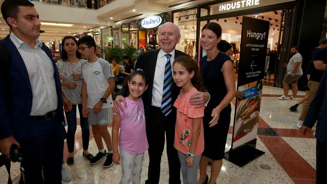 Isabella and Alessia post with the former prime minister and Fiona Martin. Picture: Toby Zerna