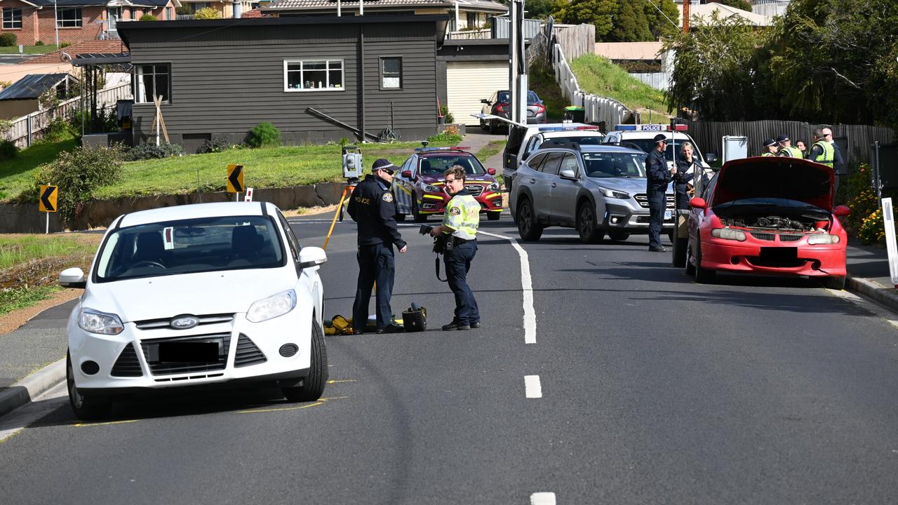 Emergency services on the scene where a 4-year-old girl was struck by a car on Cadbury Rd at Claremont. Photo: Kenji Sato