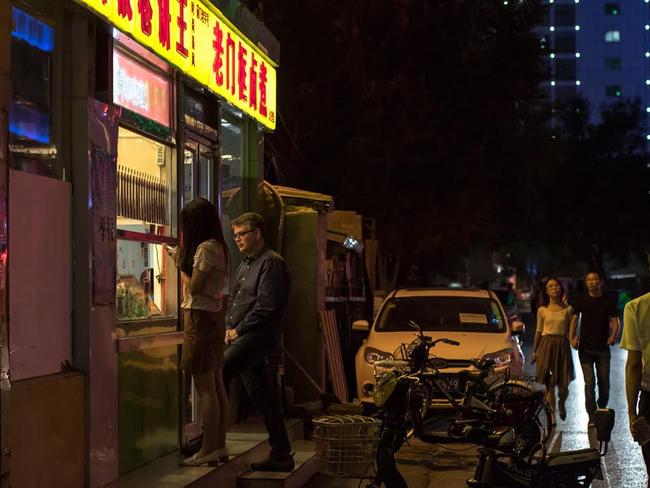 Trombone player Scott Kinmont on the streets of Beijing. Pic: Daniela Testa.