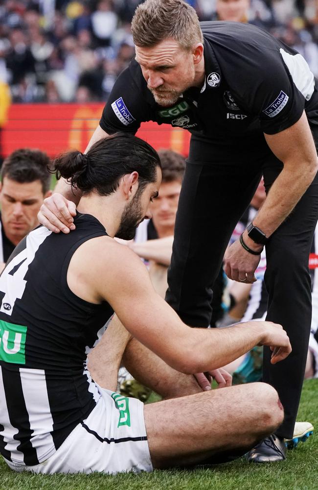 Buckley consoles Brodie Grundy after the final siren. Picture: Michael Dodge/AFL Media/Getty Images