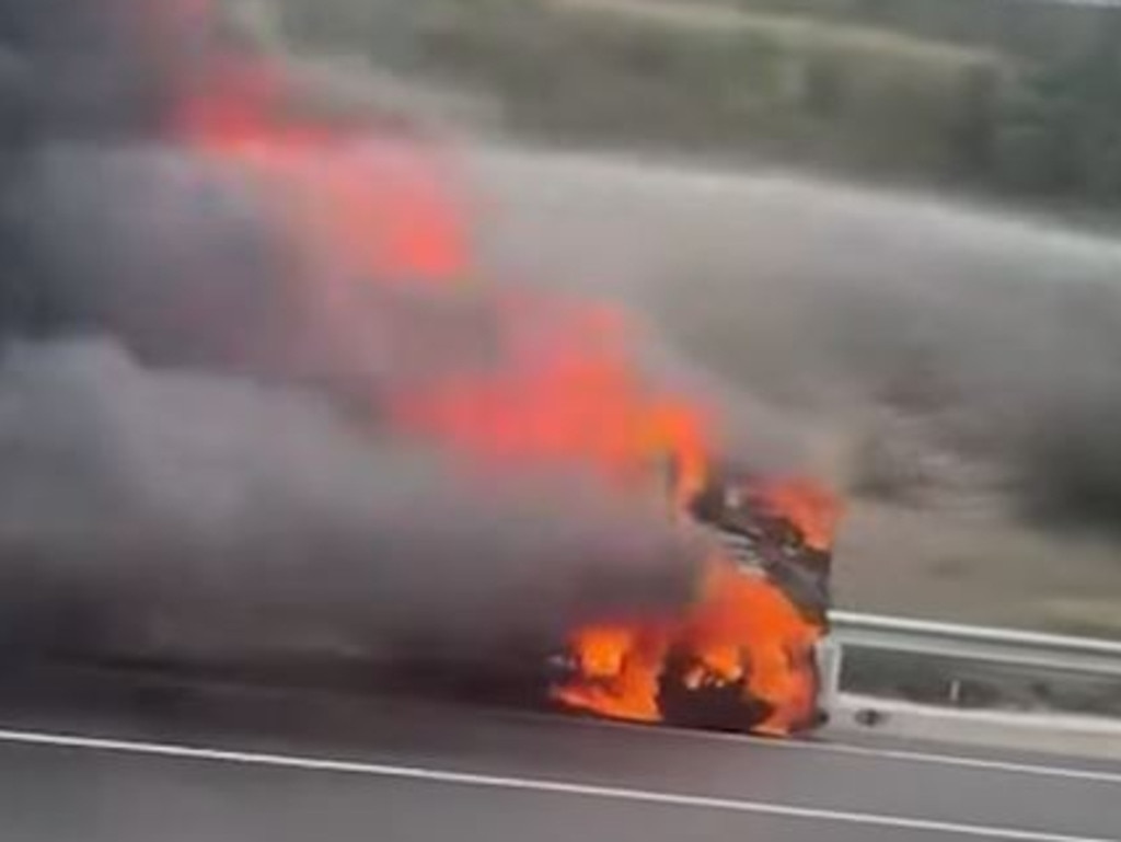 The truck cabin burst into flames about 3pm. Picture: Nine News