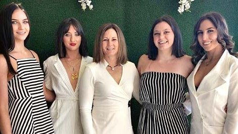 Mr Joyce’s first wife Natalie Abberfield (centre) is pictured with their four daughters Odette, Bridgette, Caroline and Julia (left to right). None of the girls attended the wedding. Picture: Instagram