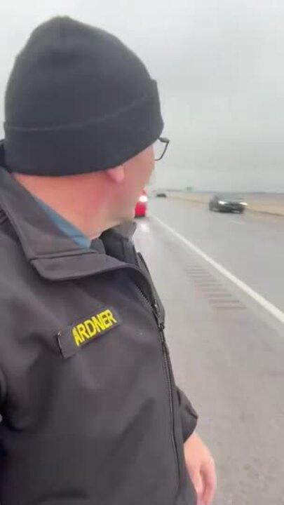 Trooper Slides Across Icy Road to Demonstrate Danger to Drivers