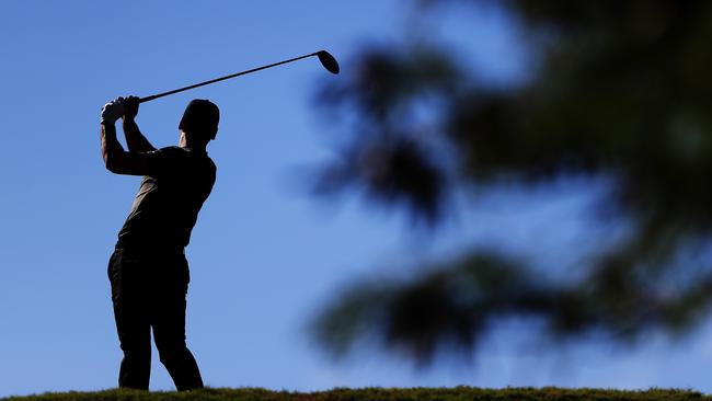 Jason Day of Australia plays his shot from the fifth tee during the final round of the Tournament of Champions.