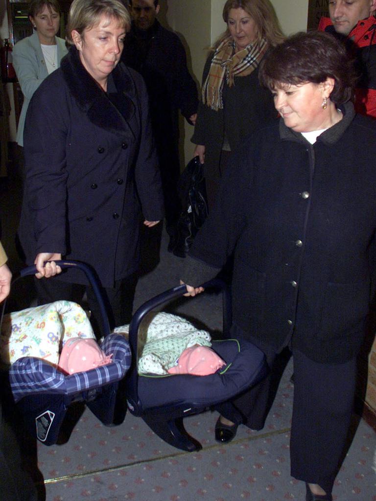 Police and social workers were pictured taking the twins from the Kilshaws. Picture: AP