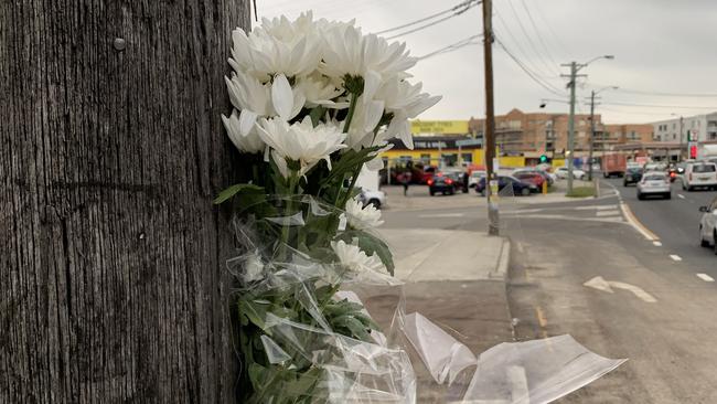 Flowers left at the scene of the collision. Picture: Nicole Pierre