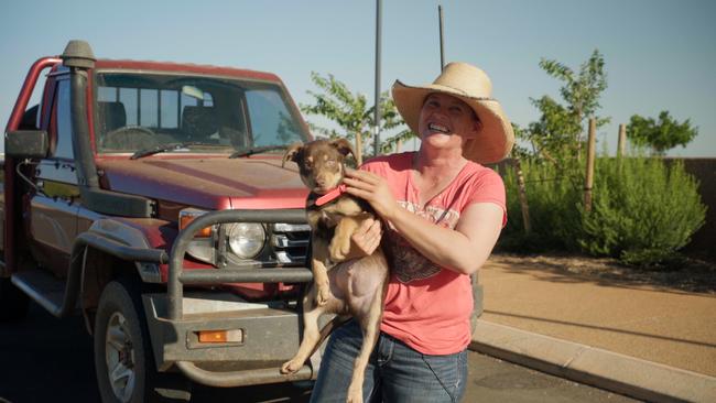 Joni Hall with puppy Chet.