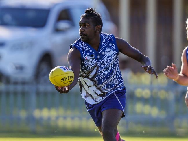 Henry Impu playing for South Alice Springs in the 2024 CAFL season. Picture: Charlie Lowson / AFLNT Media