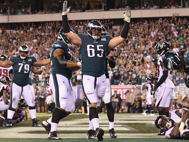 Lane Johnson (65) celebrates Jay Ajayi’s two-point conversion in the win over Atlanta. Picture: Getty