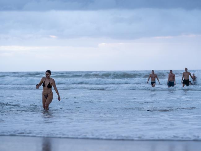 BONDI BEACH, SYDNEY, AUSTRALIA - NCA NewsWire Photos - Monday, 01 January, 2024: SYDNEY NEW DAY 2024. People continue their new years eve celebrations, at sunrise on new year's day 2024 at Bondi Beach in Sydney. Picture: NCA NewsWire / Mario Francisco 
