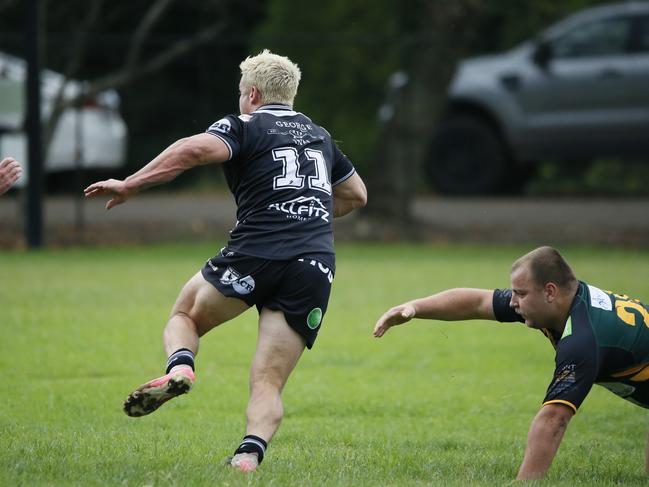 Ethan Whittington breaks away from a tackle. Picture: Warren Gannon Photography