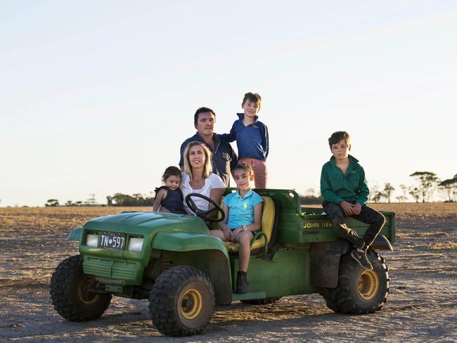 (back) Brad Jones with son Sam Jones, 6, (front left) Nina Jones, 2, wife Kate Raston, Zoe Jones, 10, and Alex Jones, 8. Photo: DANNIKA BONSER