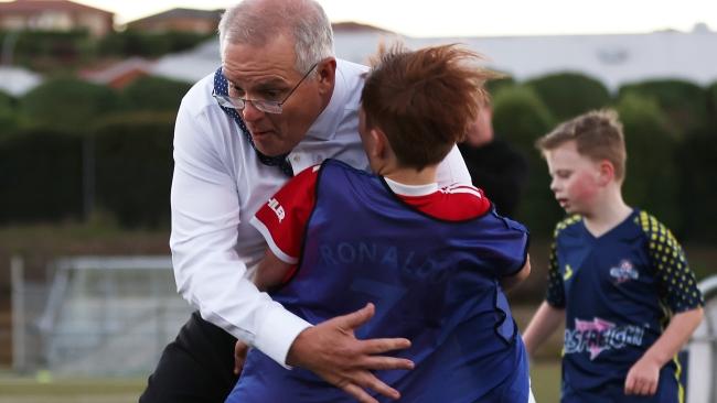 ScoMo wipes out kid at soccer