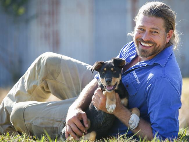 Farmer Dave Graham with three-month-old kelpie pup Chopper.