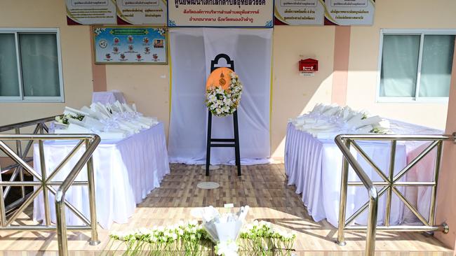 A royal wreath is displayed at the front of the nursery, where a former police officer killed at least 37 people in a mass shooting in Thailand's northeastern Nong Bua Lam Phu province on Thursday. Picture: AFP