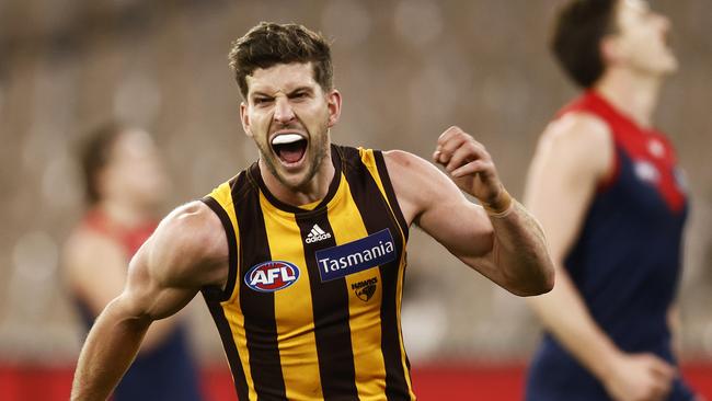 Luke Breust celebrates as the Hawks draw level against the Demons in the final minute. Picture: AFL Photos/via Getty Images