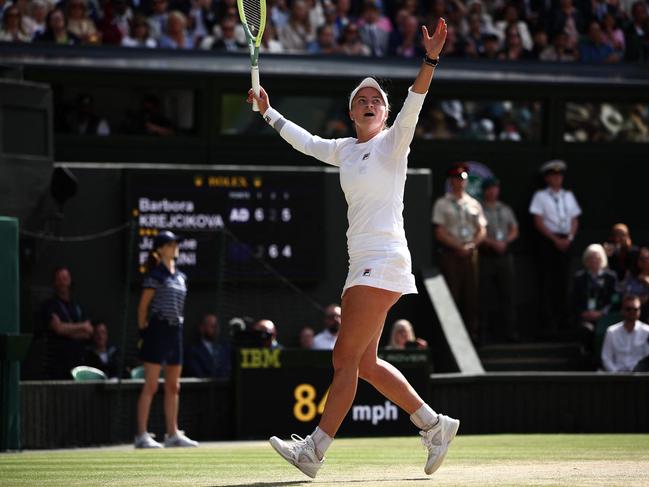 Czech Republic's Barbora Krejcikova celebrates winning against Italy's Jasmine Paolini during their women's singles final tennis match on the thirteenth day of the 2024 Wimbledon Championships at The All England Lawn Tennis and Croquet Club in Wimbledon, southwest London, on July 13, 2024. Krejcikova won the match 6-2, 2-6, 6-4. (Photo by HENRY NICHOLLS / AFP) / RESTRICTED TO EDITORIAL USE