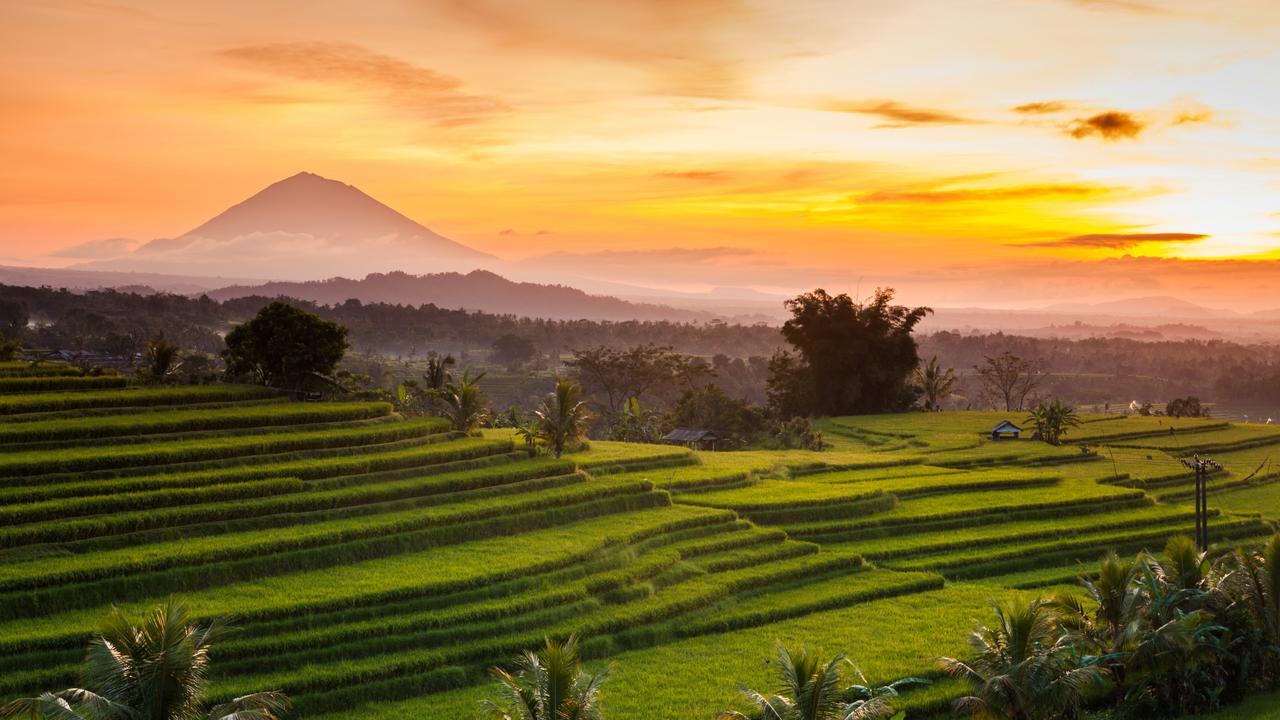 Bali locals will be welcoming tourists back with open arms. Image: Getty Images