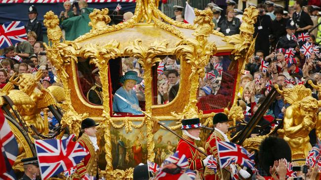 The late Queen Elizabeth and Prince Philip in the Golden State Carriage at the head of a parade from Buckingham Palace to St Paul's Cathedral celebrating the Queen's Golden Jubilee June 4, 2002. Picture: Getty