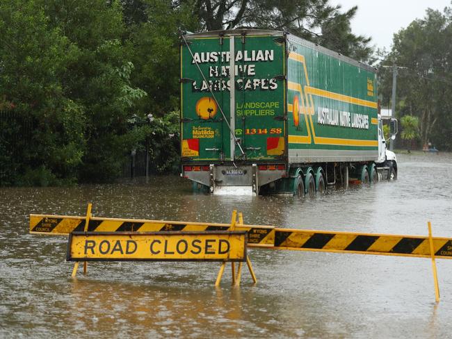 This truck tried to navigate the flooded roads. Picture: Paul Barkley | LookPro