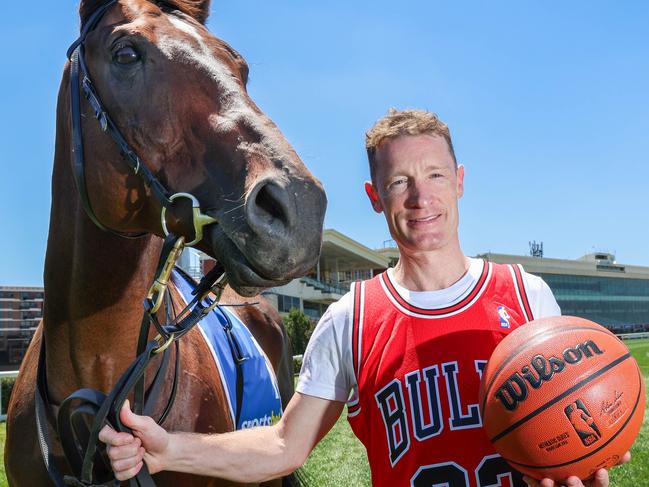 MELBOURNE, AUSTRALIA - JANUARY 30 2024 Jockey Mark Zahra on track at Caulfield to promote a basketball court being built next to the track for summer/autumn racing seasonPicture: Brendan Beckett