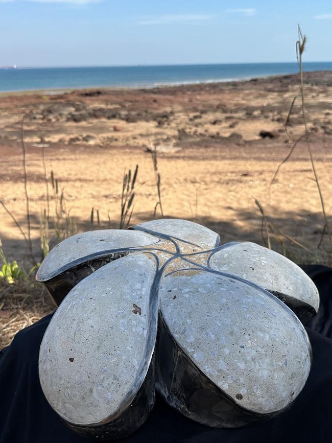 One of the frangipani sculptures, each weighing about two tons and a metre wide, which would sit alongside information plaques about the disaster. Picture: Elise Graham