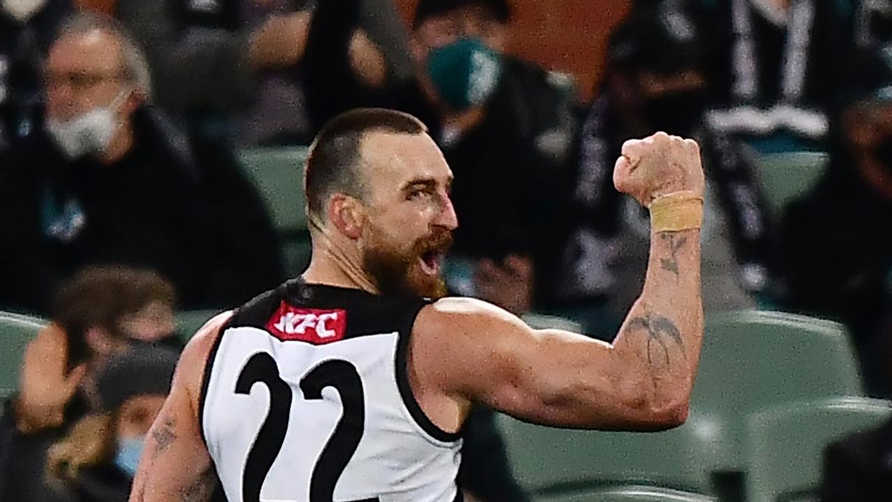 ADELAIDE, AUSTRALIA – AUGUST 14: Charlie Dixon of Port Adelaide celebrates a goal during the round 22 AFL match between Port Adelaide Power and Carlton Blues at Adelaide Oval on August 14, 2021 in Adelaide, Australia. (Photo by Mark Brake/Getty Images)