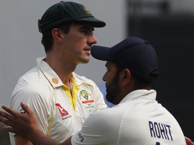 DELHI, INDIA - FEBRUARY 19: Pat Cummins of Australia interacts with the Rohit Sharma of India after the match during day three of the Second Test match in the series between India and Australia at Arun Jaitley Stadium on February 19, 2023 in Delhi, India. (Photo by Pankaj Nangia/Getty Images)