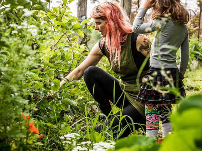 Hannah Moloney and her daughter Frida in their South Hobart garden. Picture: Natalie Mendham.