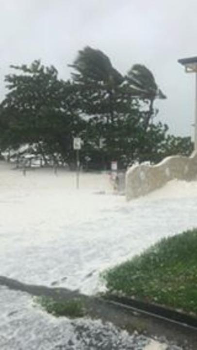 Thick Sea Foam Rolls Onto Sarina Beach During Cyclone Debbie