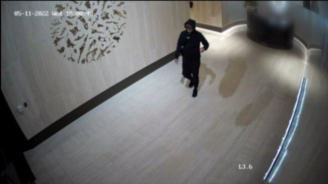 CCTV still on Hongli Qi leaving the building on Macquarie Street on May 11, 2022. Picture: NSW Police