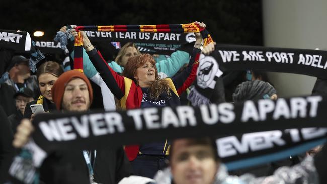 Crows and Power fans stand at Showdown 46. Picture: Sarah Reed