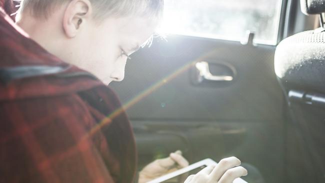 Take a tablet ... iPads and other tablets can keep children in the back seat entertained on holiday car journeys. Picture: SUPPLIED