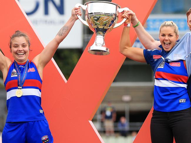 2018 NAB AFL WomenÕs Grand Final between the Western Bulldogs and the Brisbane Lions at Ikon Park, Melbourne. Western Bulldog Ellie Blackburn and Katie Brennan lift the cup. Picture: Mark Stewart