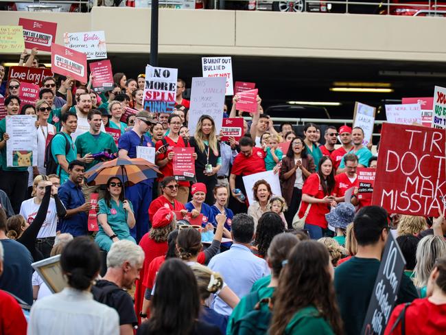 Hundreds of doctors, nurses, midwives and medical staff pictured outside St George Hospital in Kogarah to protest the NSW government's working conditions. Picture: NewsWire / Nicholas Eagar