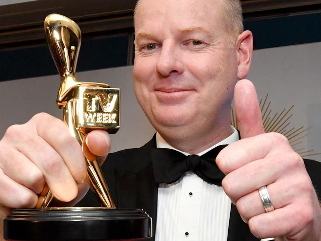 Tom Gleeson poses for a photograph after winning the Gold Logie for most popular personality on Australian TV during the 2019 Logie Awards at The Star Casino on the Gold Coast, Sunday, June 30, 2019. (AAP Image/Darren England) NO ARCHIVING, EDITORIAL USE ONLY