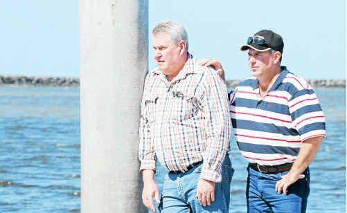 Rod and Wade Clein remember their son and brother, Rodney Clein, who went missing at sea a year ago. . Picture: Max Fleet