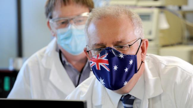 Prime Minister Scott Morrison meets CSL staff working on the COVID vaccine while he tours the company's facility in Melbourne. Picture: NCA NewsWire / Andrew Henshaw