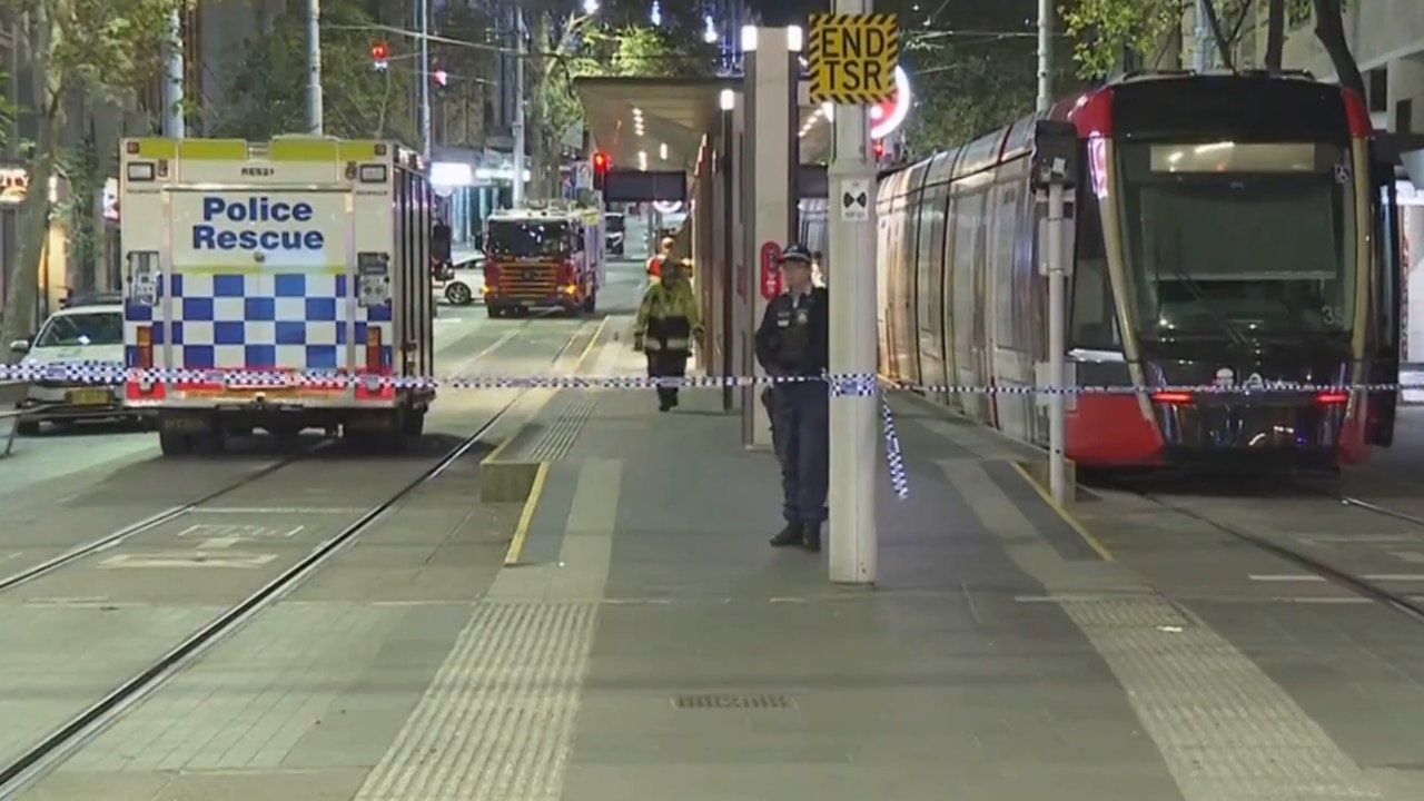 Teenager dies after being trapped under a light rail in Sydney CBD