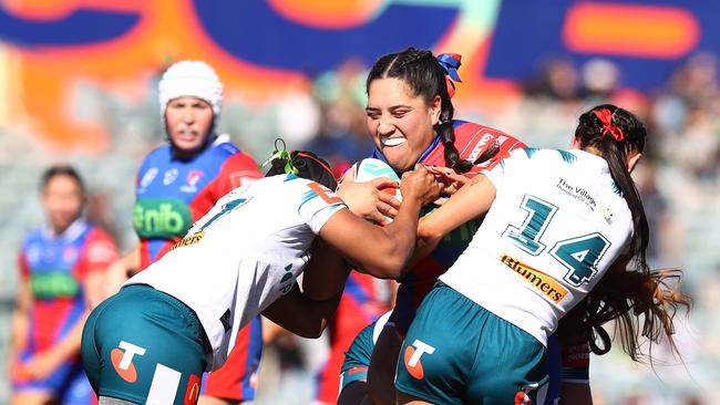 CANBERRA, AUSTRALIA – AUGUST 03: Rima Butler of the Knights is tackled during the round two NRLW match between Canberra Raiders and Newcastle Knights at GIO Stadium on August 03, 2024 in Canberra, Australia. (Photo by Mark Nolan/Getty Images)