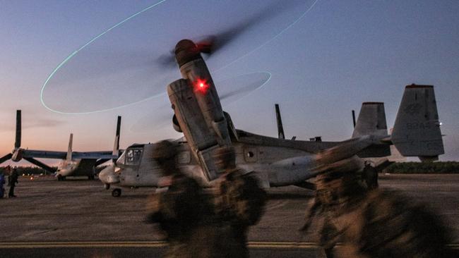 US Marines arrive at RAAF Base Darwin after departing Nackaroo Airfield aboard MV-22 Osprey's following Exercise Loobye. Picture: Glenn Campbell