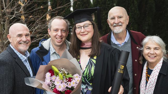 Master of Professional Studies (Research) graduate Gabriella Hartig-Franc is congratulated by (from left) Paul Olive, Paul Askew, Paul Franc and Jana Hartig at a UniSQ graduation ceremony at The Empire, Tuesday, June 25, 2024. Picture: Kevin Farmer