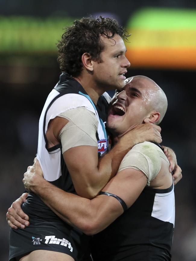 Steven Motlop is congratulated by Sam Powell-Pepper after the kick. Picture: Sarah Reed