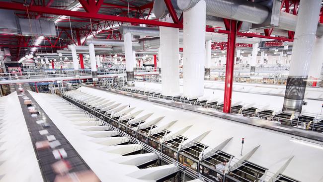 Australia Post is working hard during the pandemic to sort out mail. Picture: Australia Post.