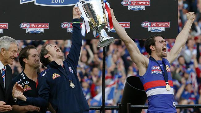 Bob Murphy and Easton Wood lift the 2016 premiership cup. Picture: Wayne Ludbey